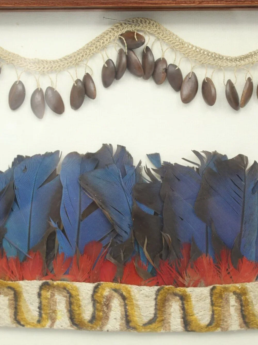 FEATHERWORK HEADDRESS OR ADORNMENT FRAGMENTS CREATED BY AMAZONIAN INDIGENOUS